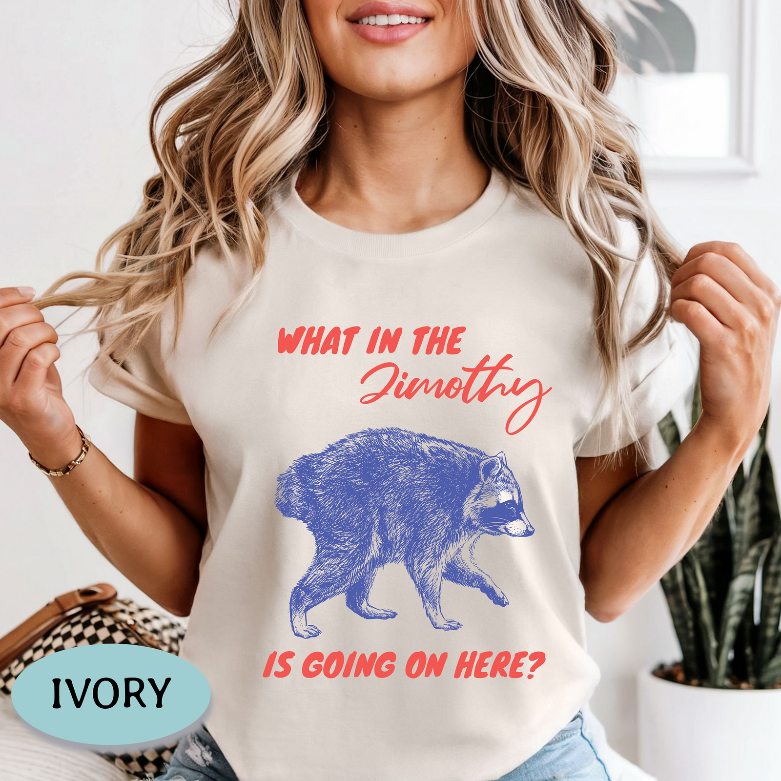 What in the Jimothy funny raccoon graphic on Ivory Comfort Colors shirt